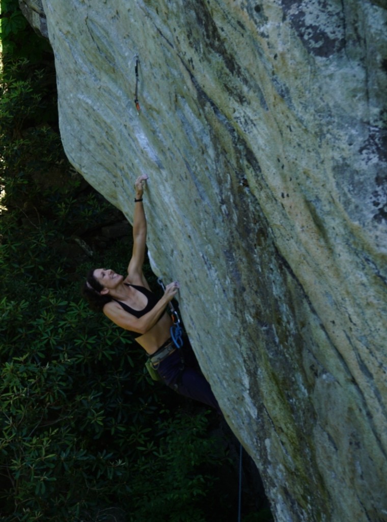 Pulling the initial roof crux on Line of Fire 12c Photo creds: Justin Hedrick